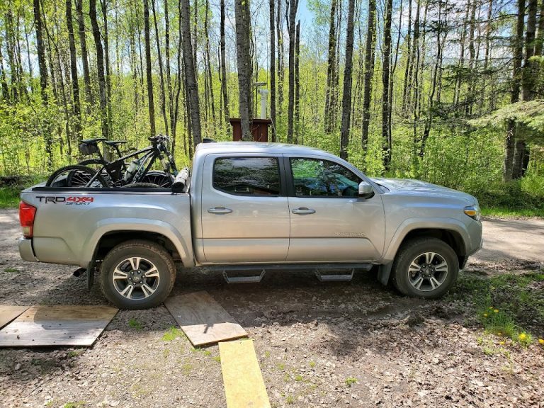 Toyota Tacoma with mountain bikes in the back