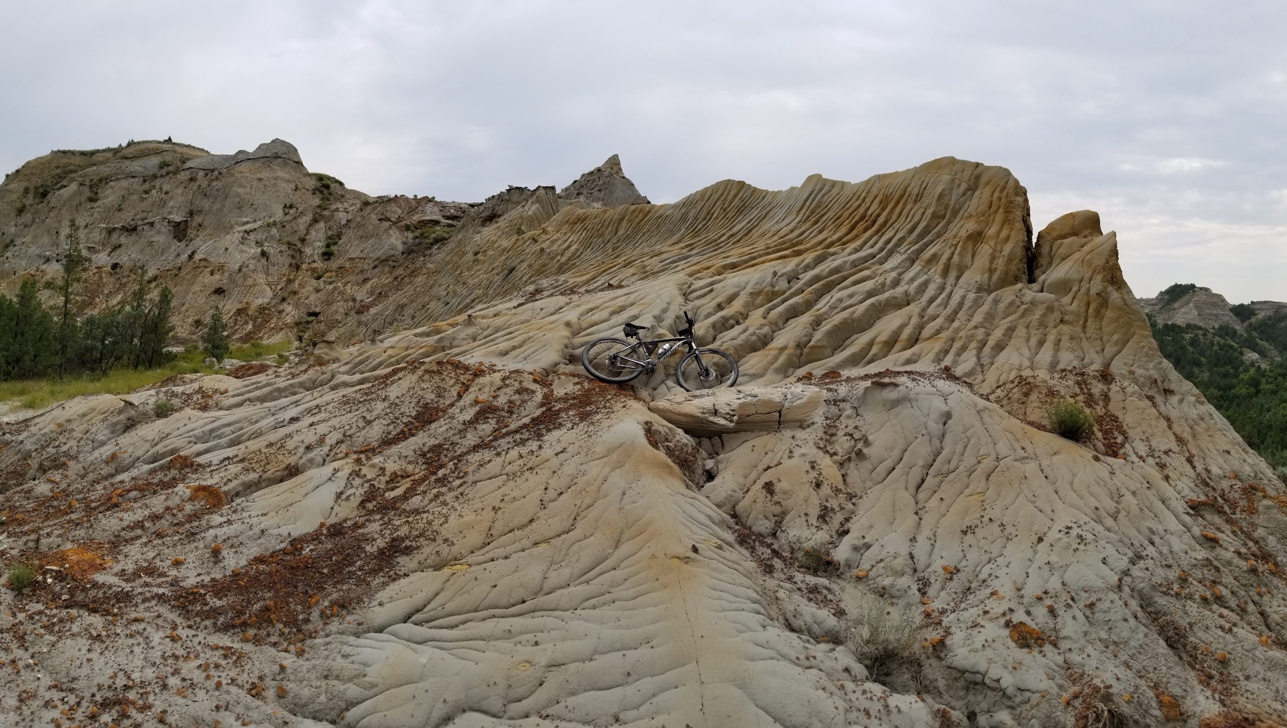 Mountain bike leaning against the base of the China Wall