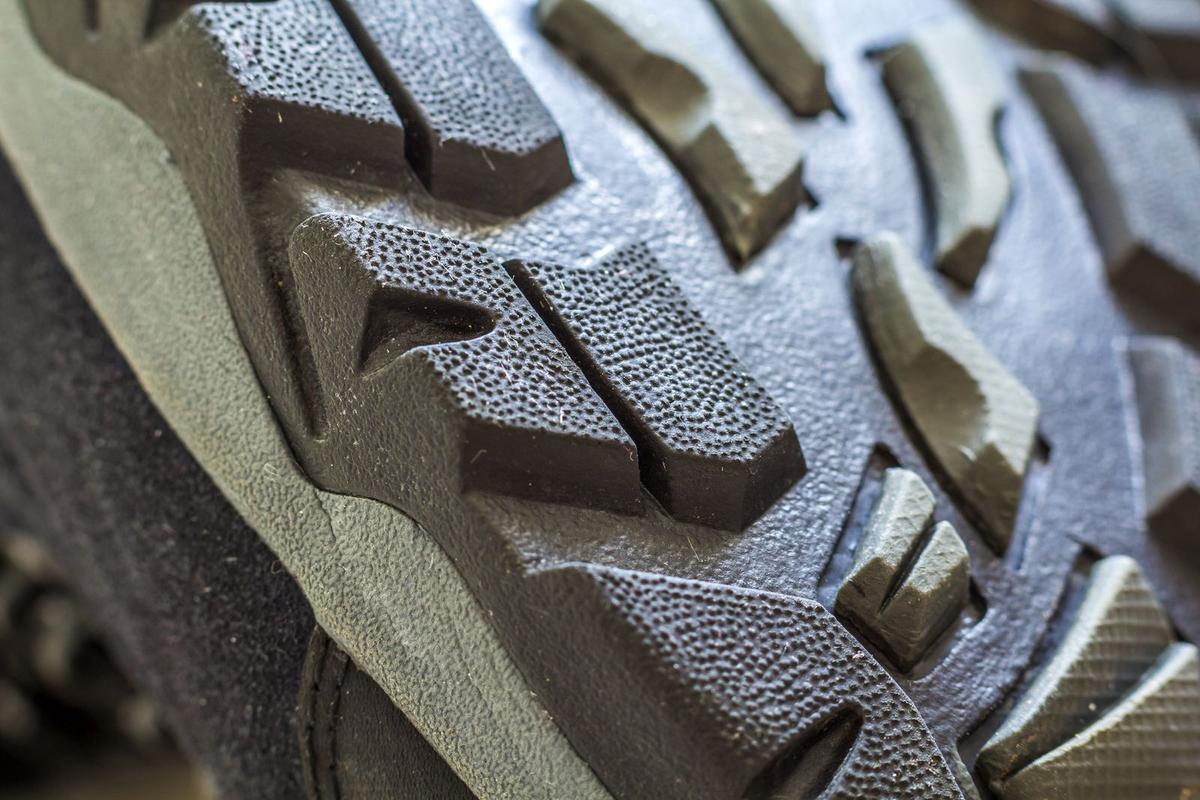 Extreme close-up of lugged rubber tread blocks