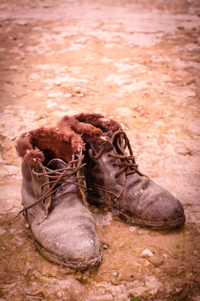 Well-worn vintage-style leather lace-up boots